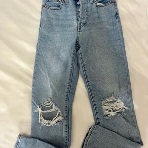 Women's Light Blue Distressed Jeans